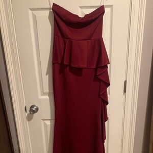 Maroon strapless Mardi Gras gown.